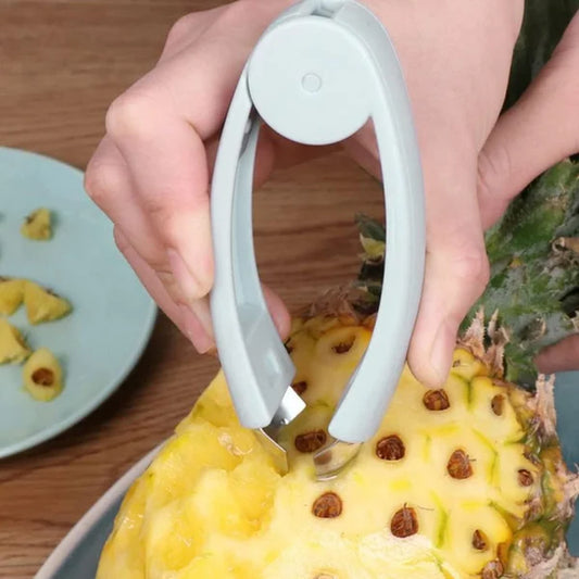 Multifunktionell ögonborttagare med ananas