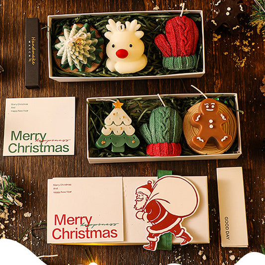 Juldoftande ljus i presentförpackning