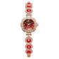 Elegant damklocka med strass och blommig bezel