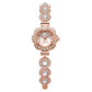 Elegant damklocka med strass och blommig bezel