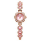 Elegant damklocka med strass och blommig bezel